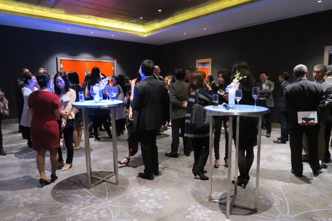 Guests socialize during a formal  reception in Shanghai.