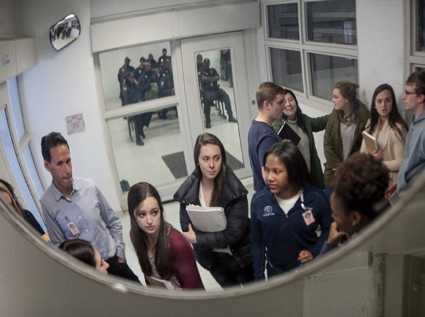 students touring the prison